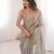 Beige colour fendy satin embroidered lace border saree
