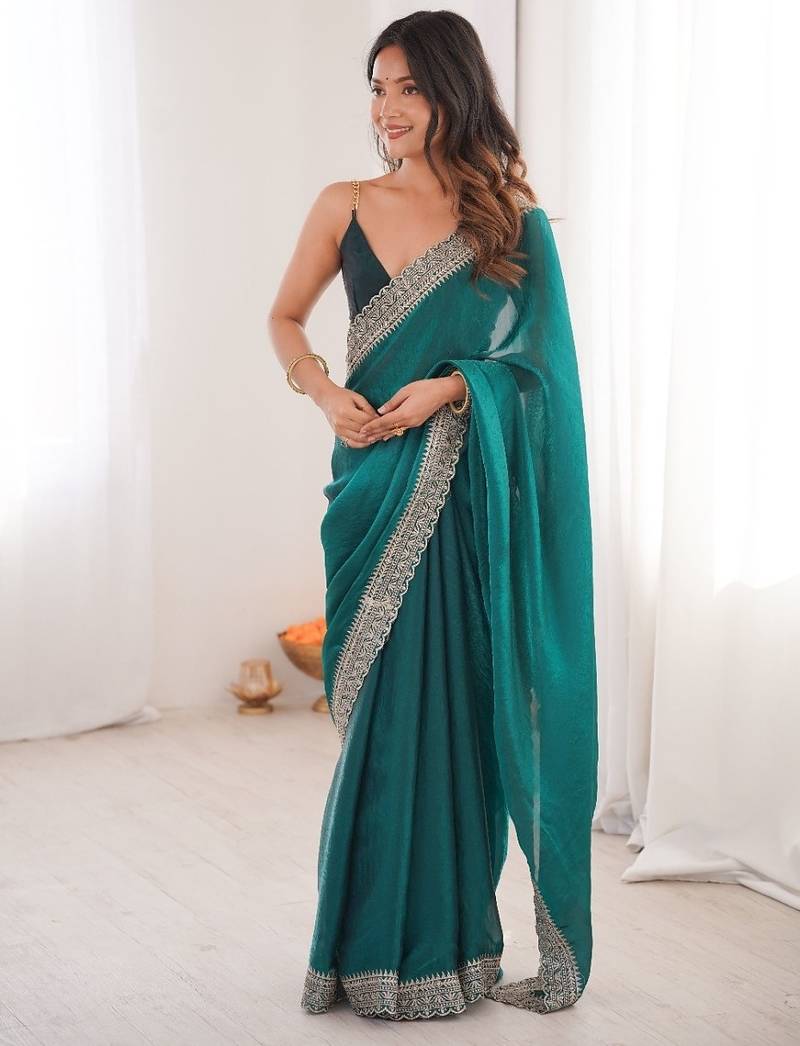 Teal colour fendy satin embroidered lace border saree