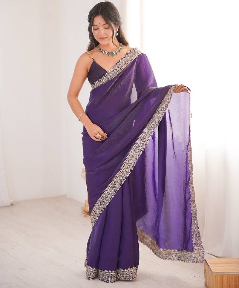 Purple colour fendy satin embroidered lace border saree