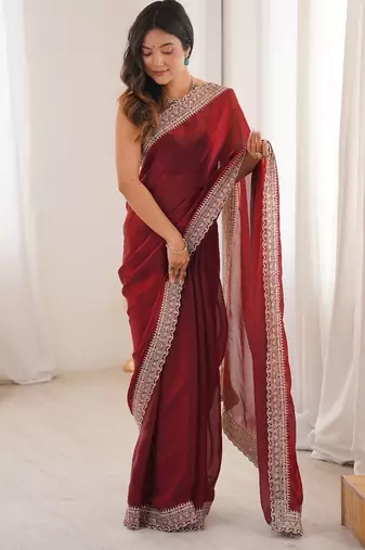 Red colour fendy satin embroidered lace border saree