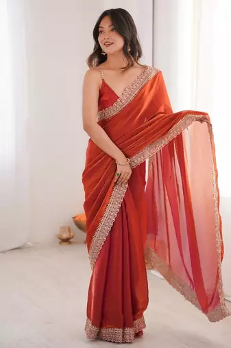 Orange colour fendy satin embroidered lace border saree