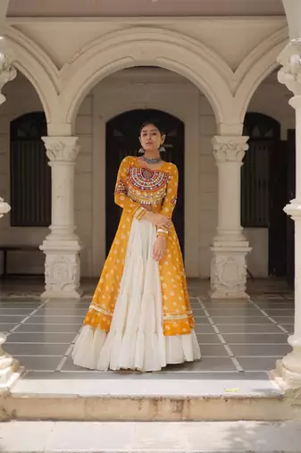 Bandhani Print Faux Georgette Kurti with Kora Cotton Frill Lehenga Set