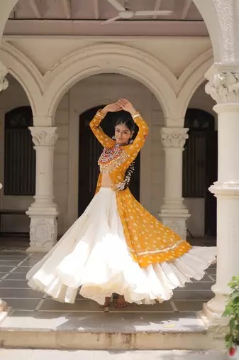 Bandhani Print Faux Georgette Kurti with Kora Cotton Frill Lehenga Set