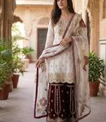 Wine colour pure gmy silk embroidered palazzo suit set with organza dupatta