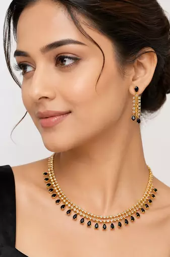 Ad necklace set with earrings, gold-toned, black teardrop stone, american diamond jewellery set