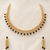 Ad necklace set with earrings, gold-toned, black teardrop stone, american diamond jewellery set