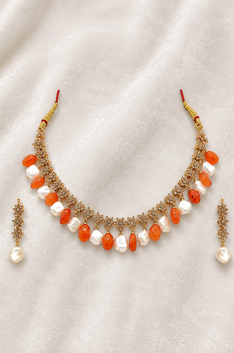 Gold-toned necklace set with orange beads and baroque pearls, ethnic indian jewellery, with earrings