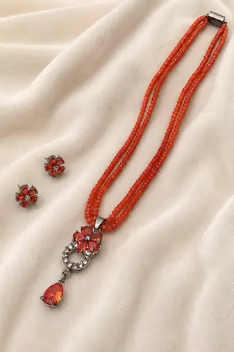 Red beads maala set with flower pendant, multi-strand necklace with matching stud earrings