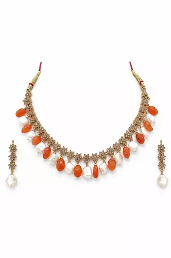 Gold-toned necklace set with orange beads and baroque pearls, ethnic indian jewellery, with earrings