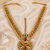 Red and green kundan bridal headpiece