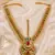 Red and green kundan bridal headpiece