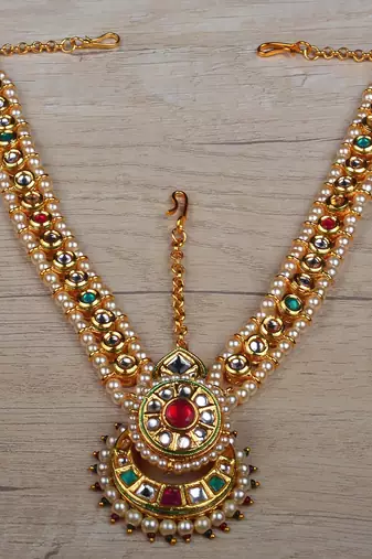Red and green kundan bridal headpiece