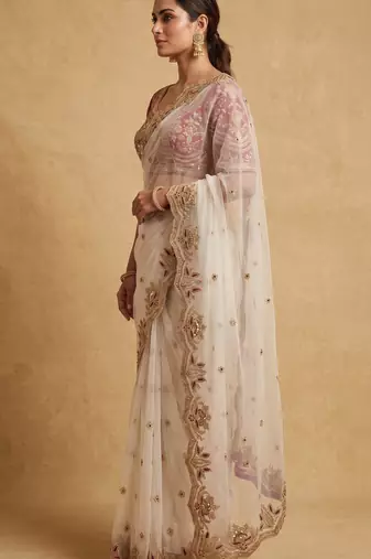 White embroidered net designer saree with designer rani pink blouse fabric