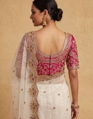 White embroidered net designer saree with designer rani pink blouse fabric 4