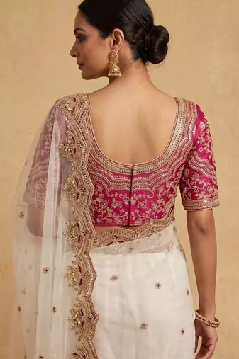 White embroidered net designer saree with designer rani pink blouse fabric