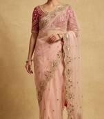 Peach embroidered net designer saree with designer rani pink blouse fabric