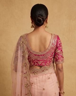Peach embroidered net designer saree with designer rani pink blouse fabric 3