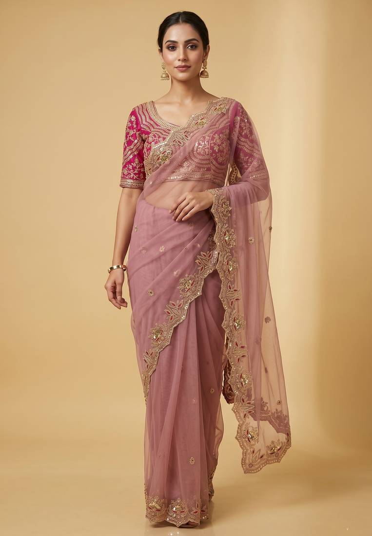 Dusty pink embroidered net designer saree with designer rani pink blouse fabric