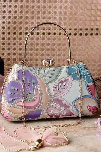   woven reverie mint green multi abstract floral embroidered clutch
