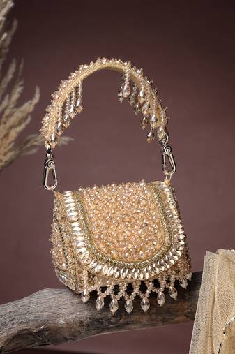   crystal cascade champagne gold suede embellished clutch