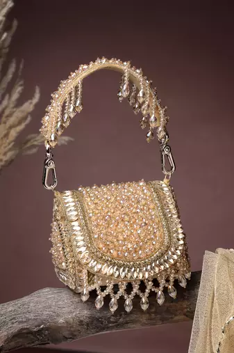   crystal cascade champagne gold suede embellished clutch