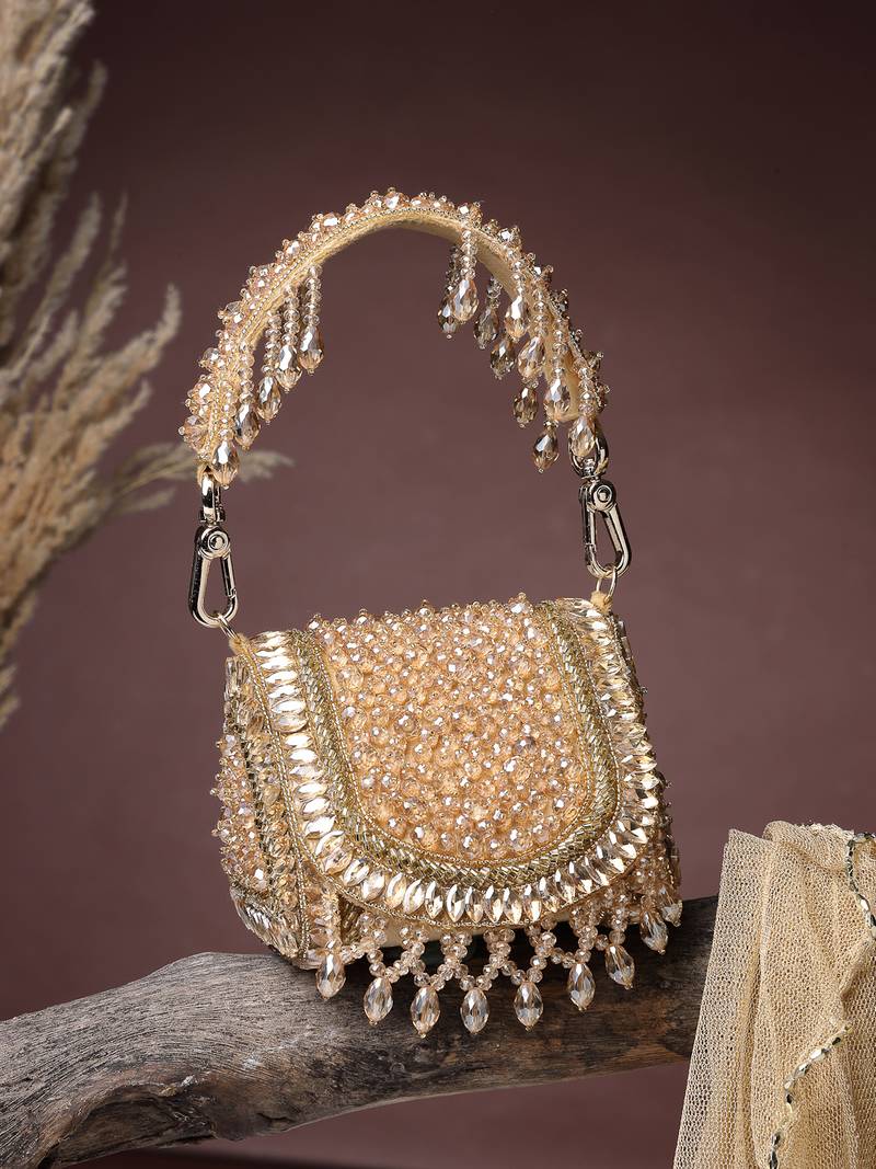   crystal cascade champagne gold suede embellished clutch