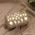   tipify metallic gold geometric mirror embellished clutch