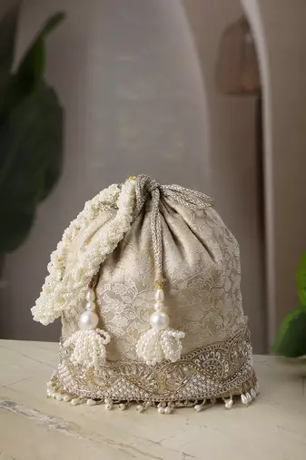   jashn edit champagne faux silk floral jacquard potli