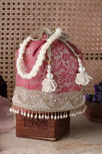   jashn edit rani pink faux silk floral jacquard potli