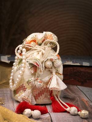  jashn edit ivory faux silk chevron woven potli 1
