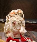   jashn edit ivory faux silk chevron woven potli