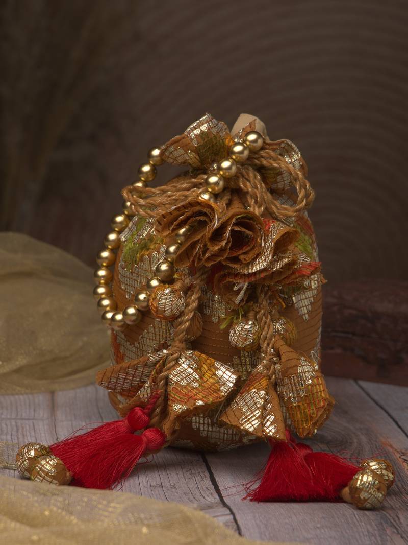   jashn edit rust brown faux silk chevron woven potli