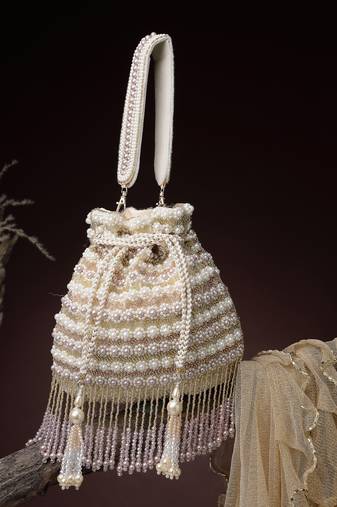   dewdrop fringe champagne gold velvet beaded potli