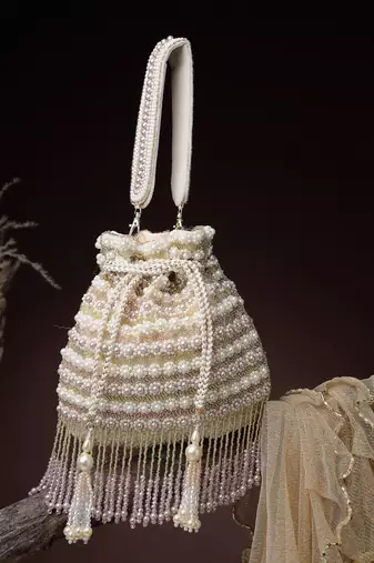   dewdrop fringe champagne gold velvet beaded potli