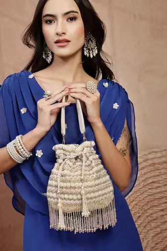   dewdrop fringe champagne gold velvet beaded potli