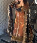 Golden embroidered faux georgette women's kurta set