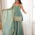 Sea green colour fendy silk embroidered kurta bell bottom set