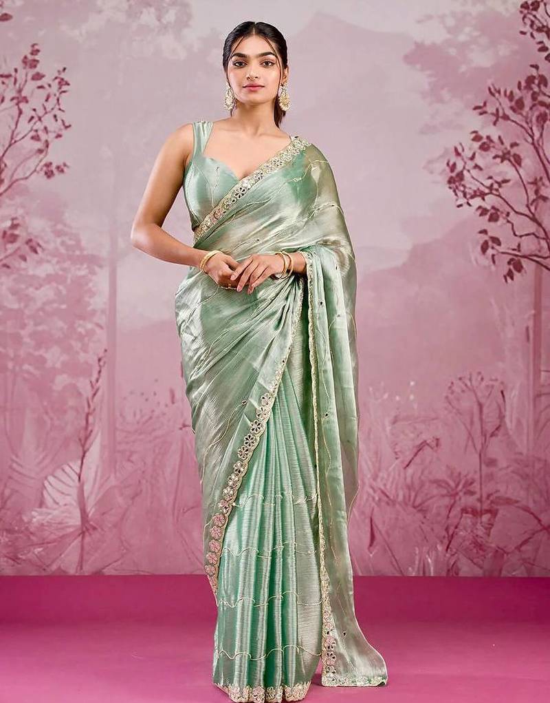 Sage green colour soft burberry silk mirror work saree with blouse