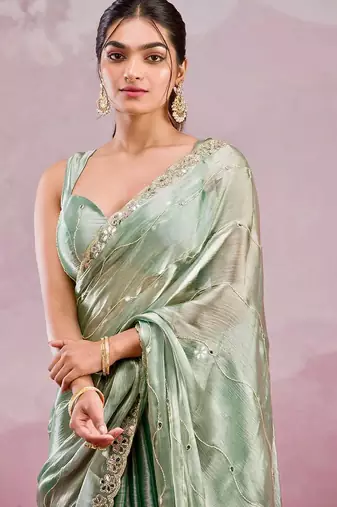 Sage green colour soft burberry silk mirror work saree with blouse