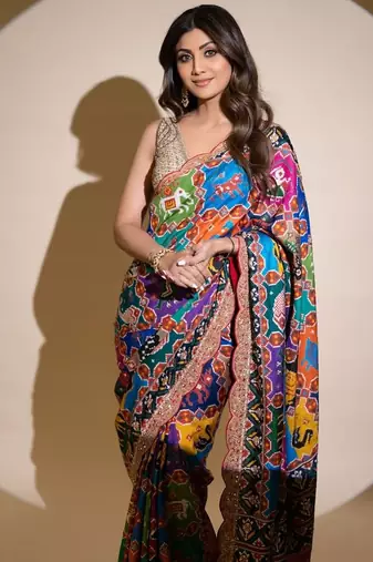 Multi colour patola print georgette saree with swarovski work