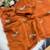 Heavy aari work satin saree for women orange party wear