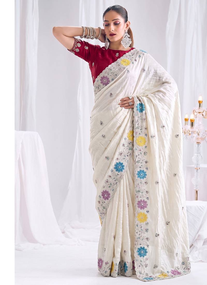 Prada silk blend heavy embroidery white saree with apliqe work