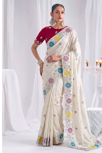 Prada silk blend heavy embroidery white saree with apliqe work