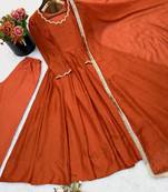 Rust orange solid anarkali kurta with pants and dupatta set