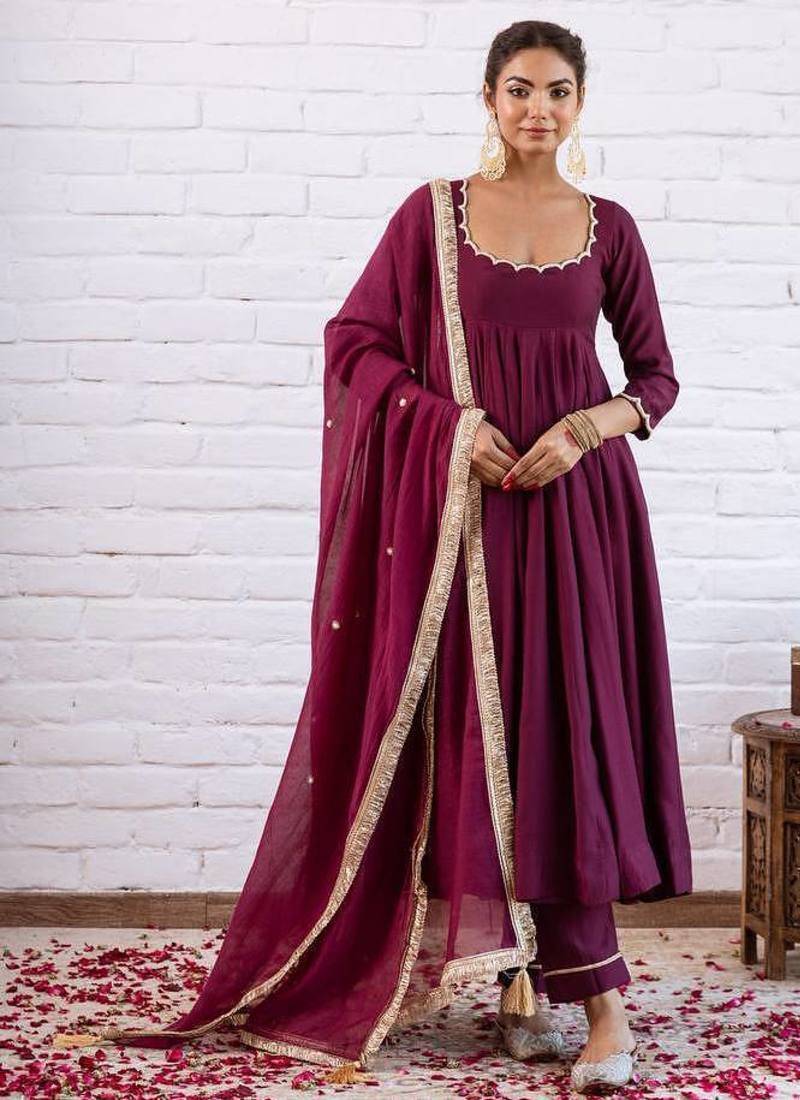 Wine solid silk blend anarkali suit with pants and dupatta