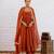 Rust orange solid anarkali kurta with pants and dupatta set