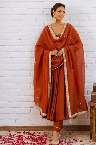 Rust orange solid anarkali kurta with pants and dupatta set