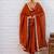 Rust orange solid anarkali kurta with pants and dupatta set