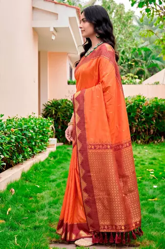 Sangam prints bright orange silk woven work traditional saree
