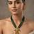 Women gold-plated & green multi-strand lakshmi temple jewellery set
